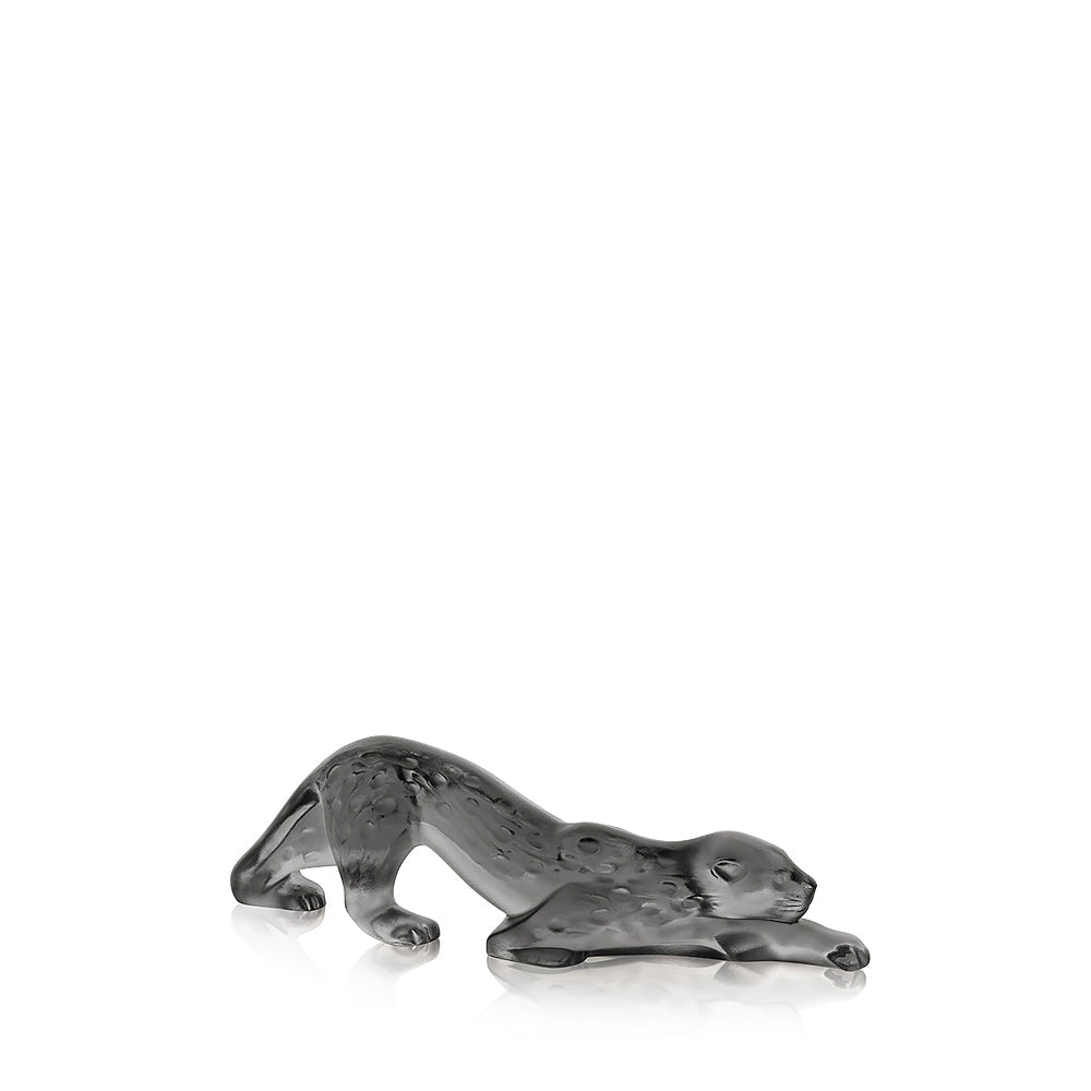 Metallic animal figurine on a white background