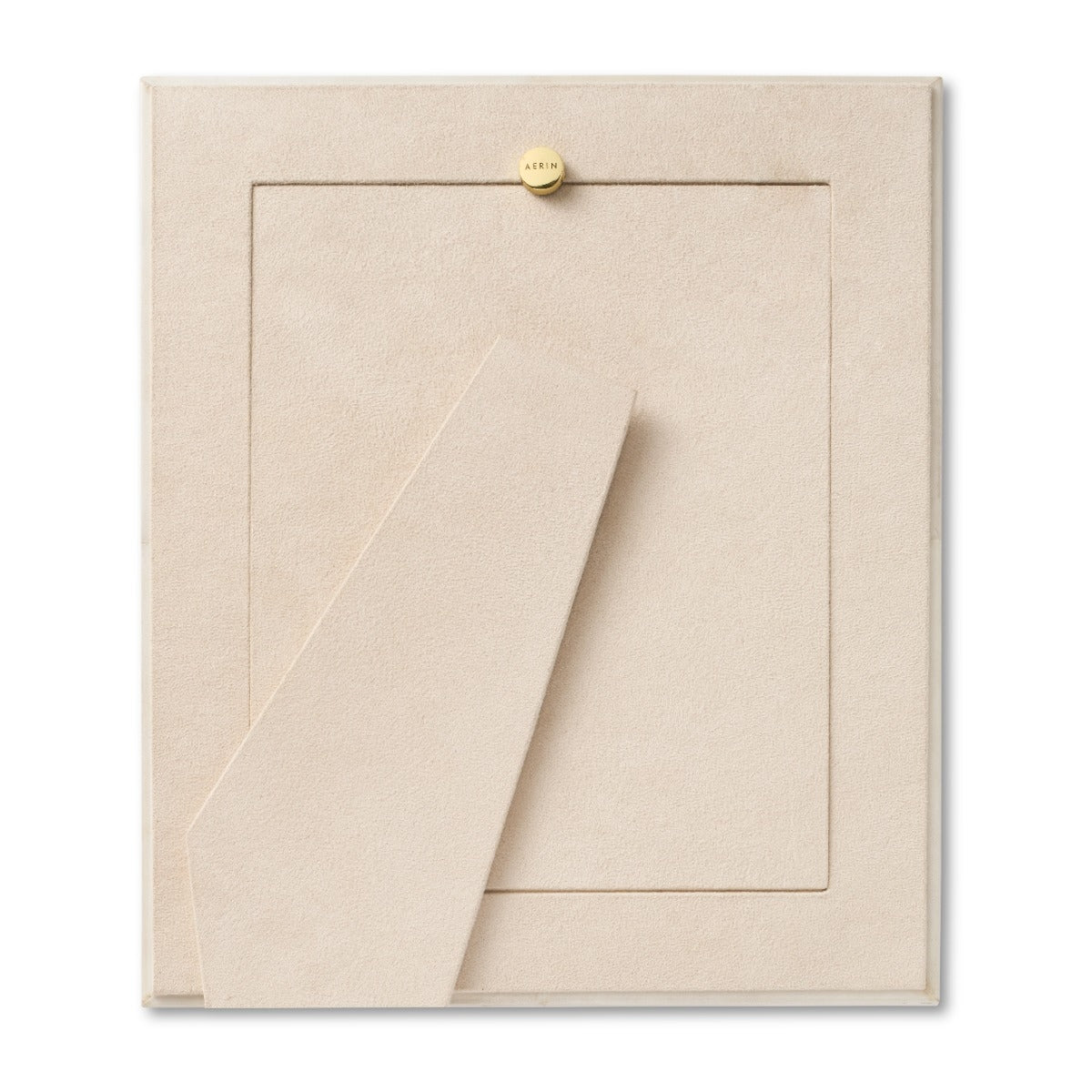 Beige fabric panel with a gold button on a white background