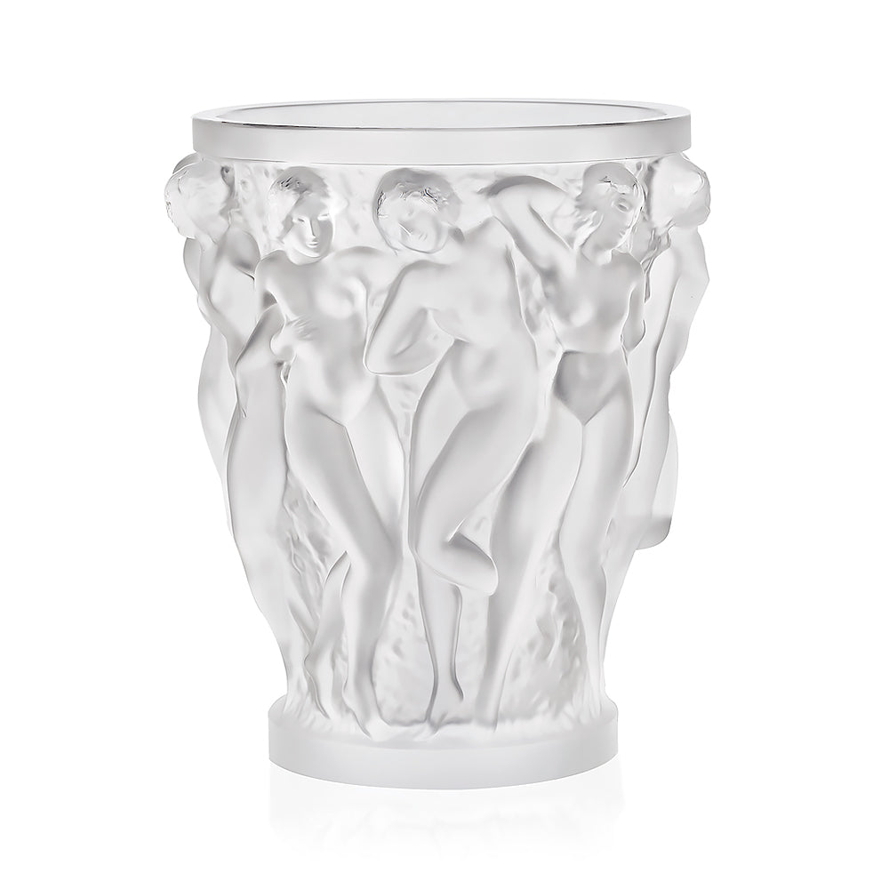 Decorative glass vase with artistic figures on a white background