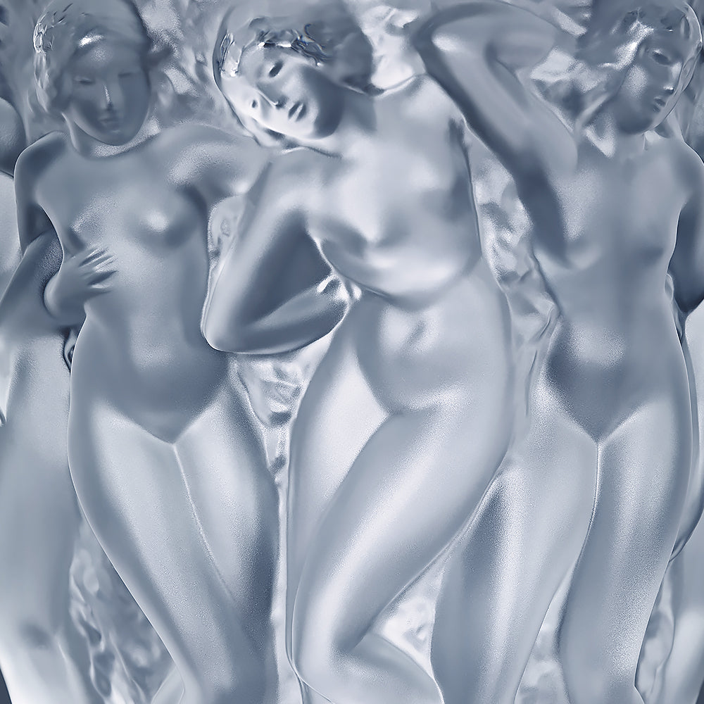 Group of nude female figures in a classical style