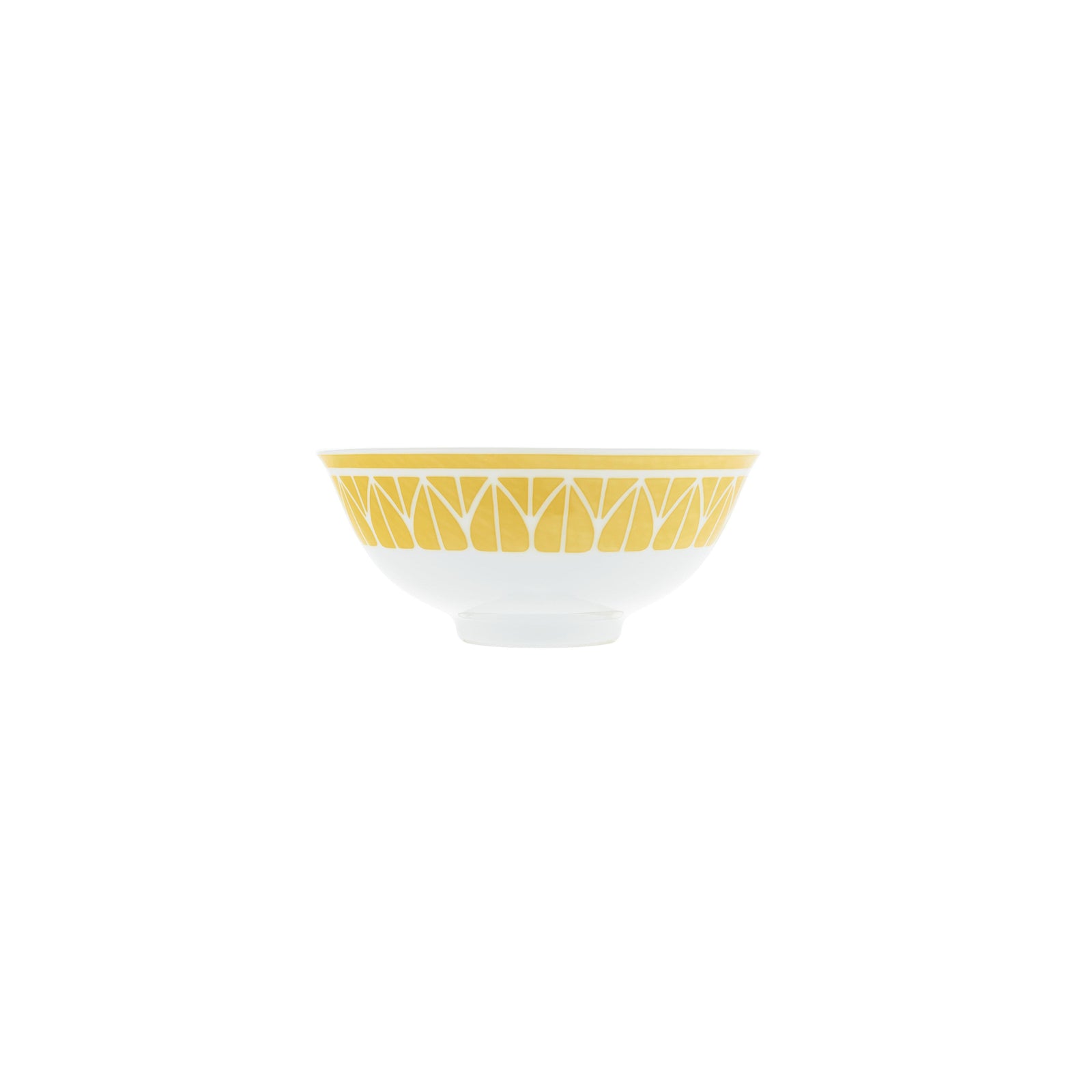 White bowl with yellow geometric pattern on a green background
