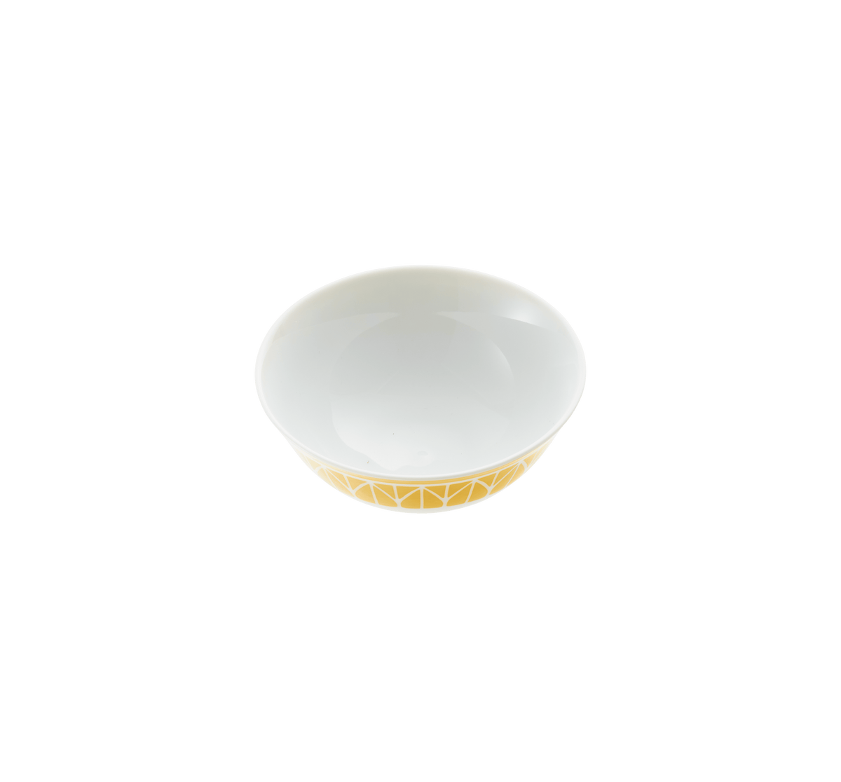 White ceramic bowl with gold interior on a green background