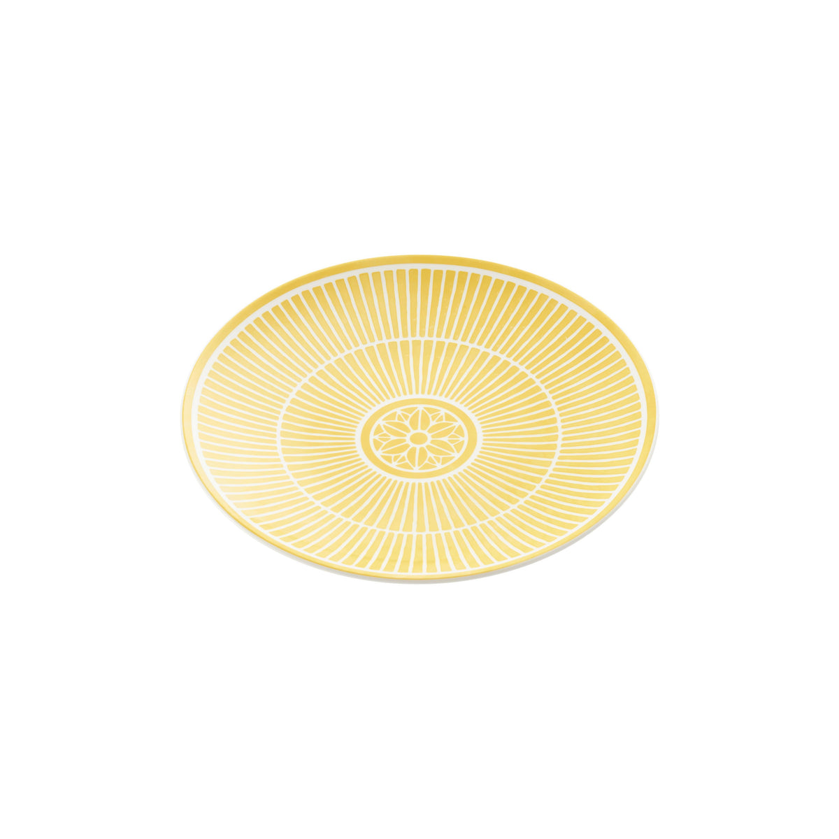 Yellow decorative plate with a circular design on a green background
