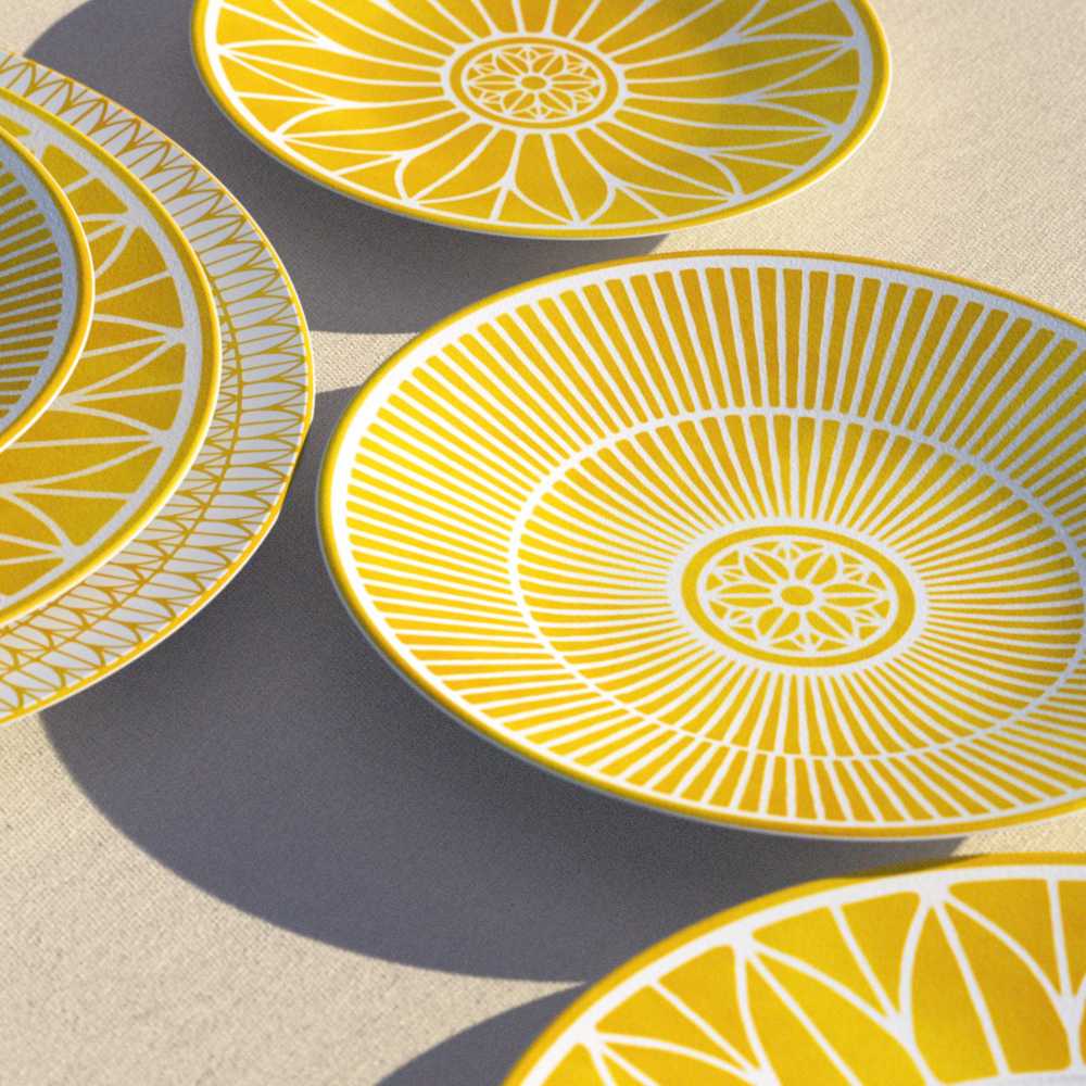 Decorative yellow circular design on a white background