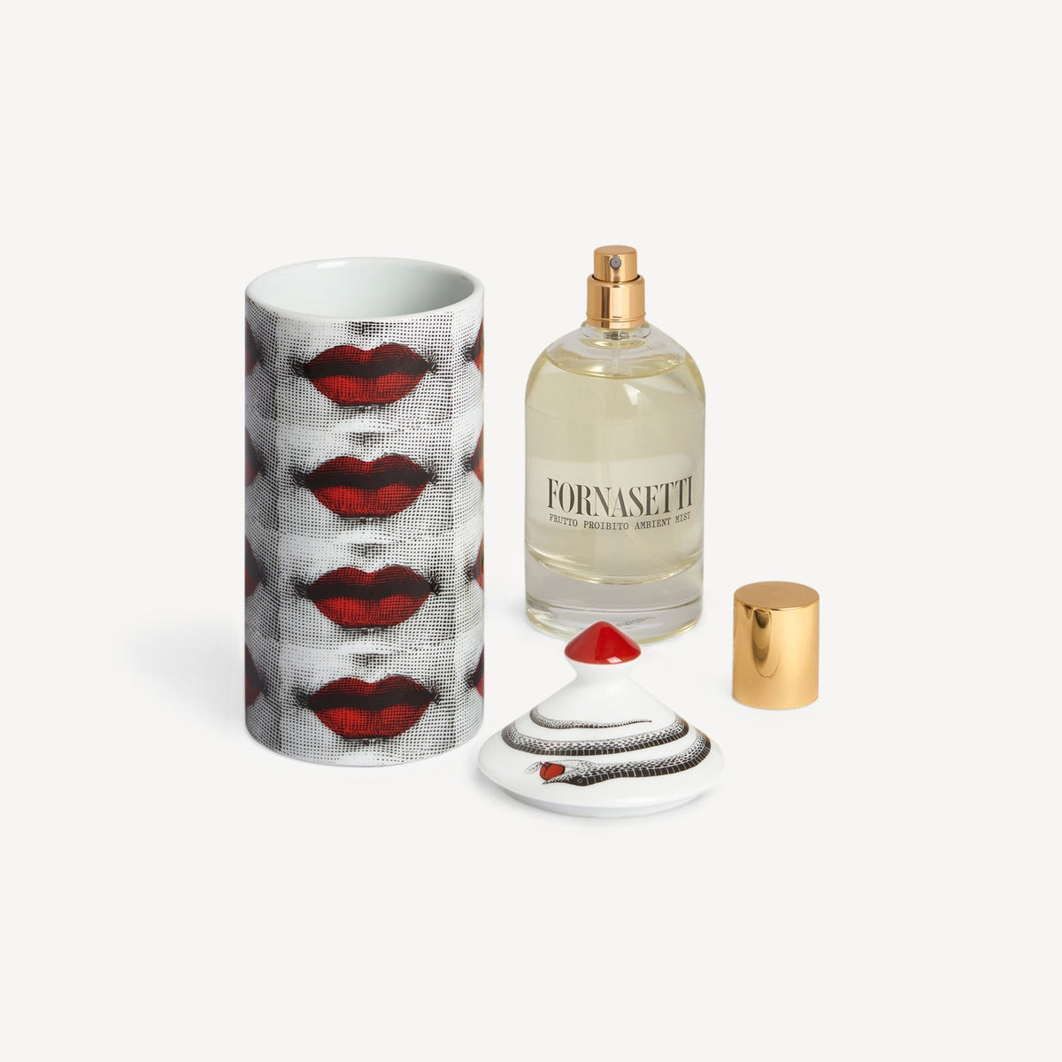 Fornasetti perfume bottle with red lip design packaging on a white background