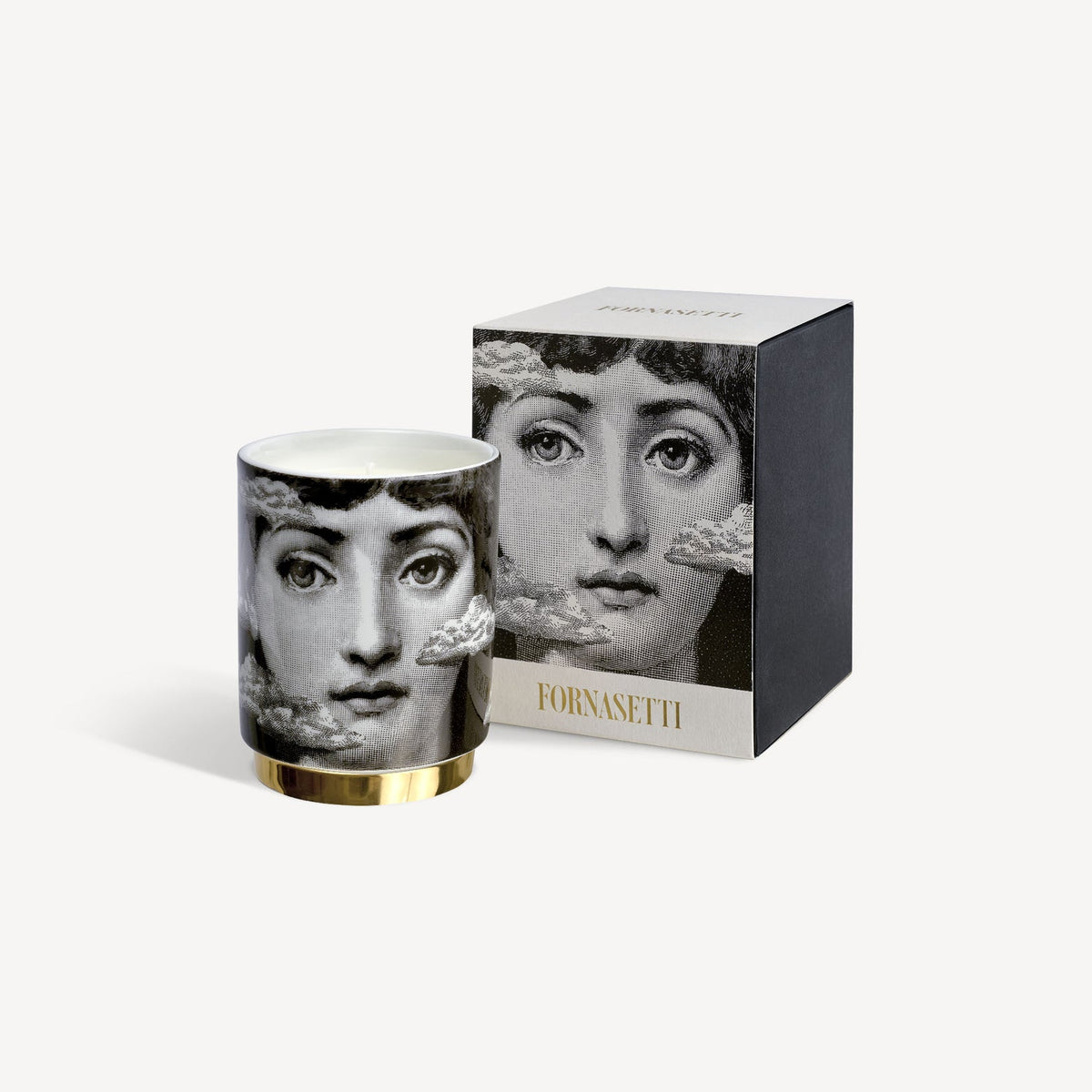 Fornasetti candle and packaging on a white background