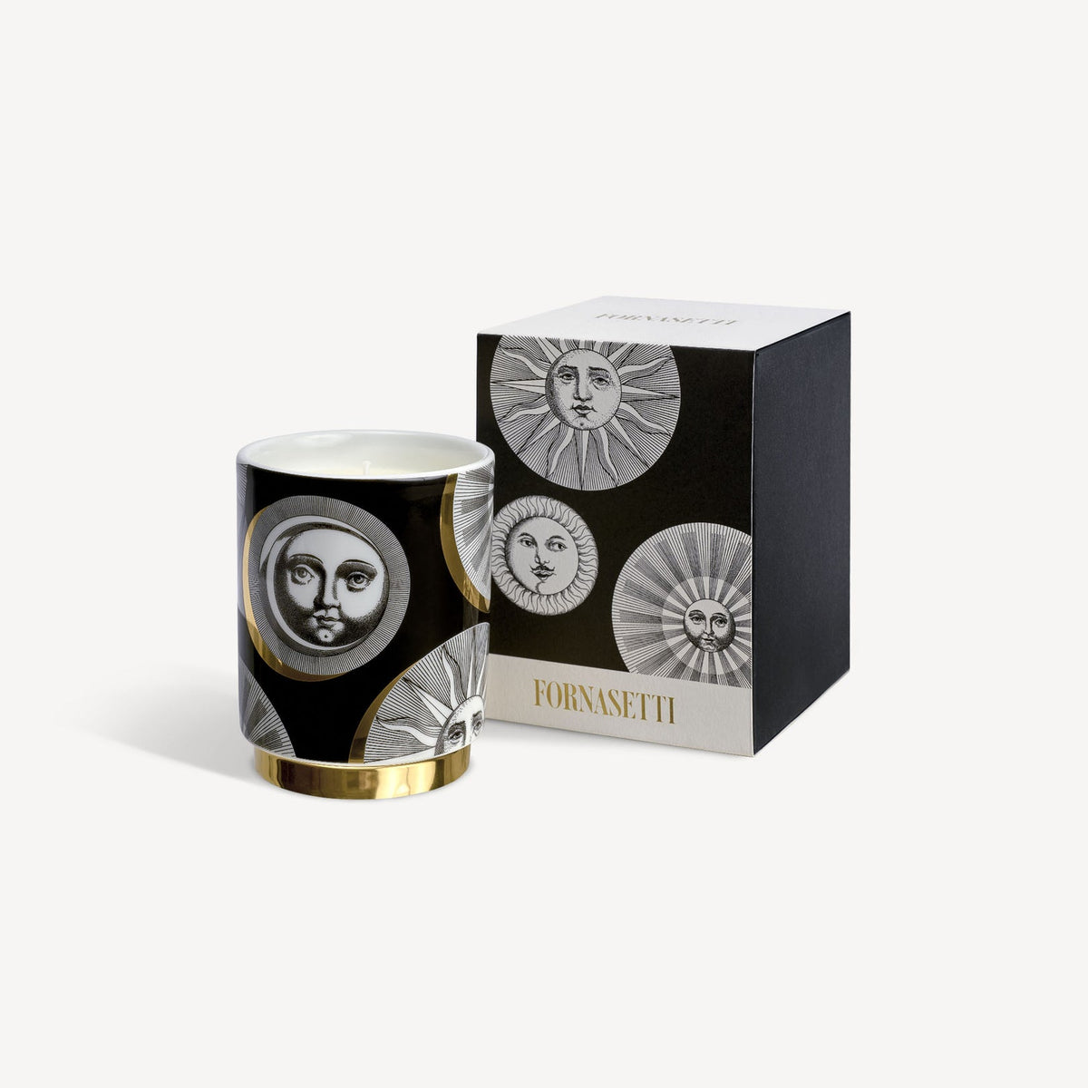 Fornasetti candle and packaging on a white background