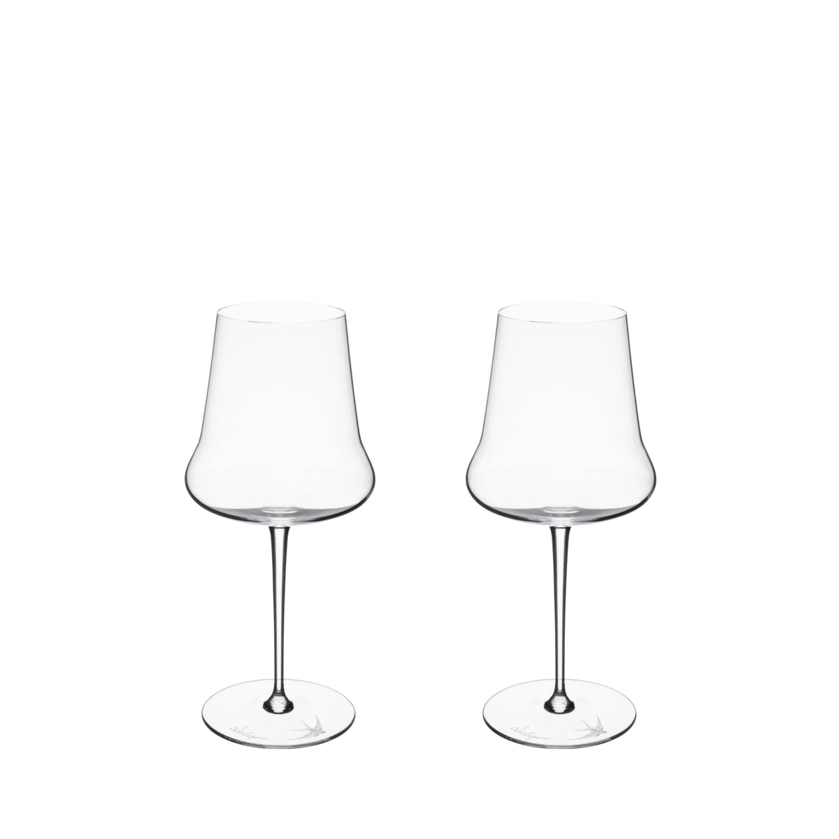 Two clear wine glasses on a white background